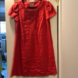 Orange linen dress with decorative neckline